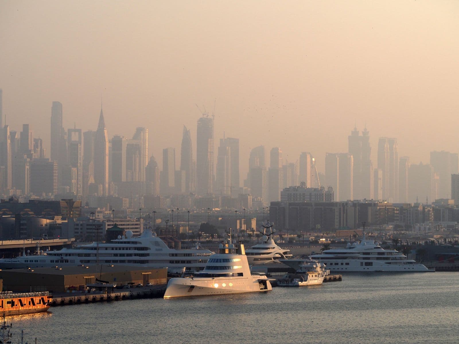 Dubai Marina skyline with residential towers and yachts