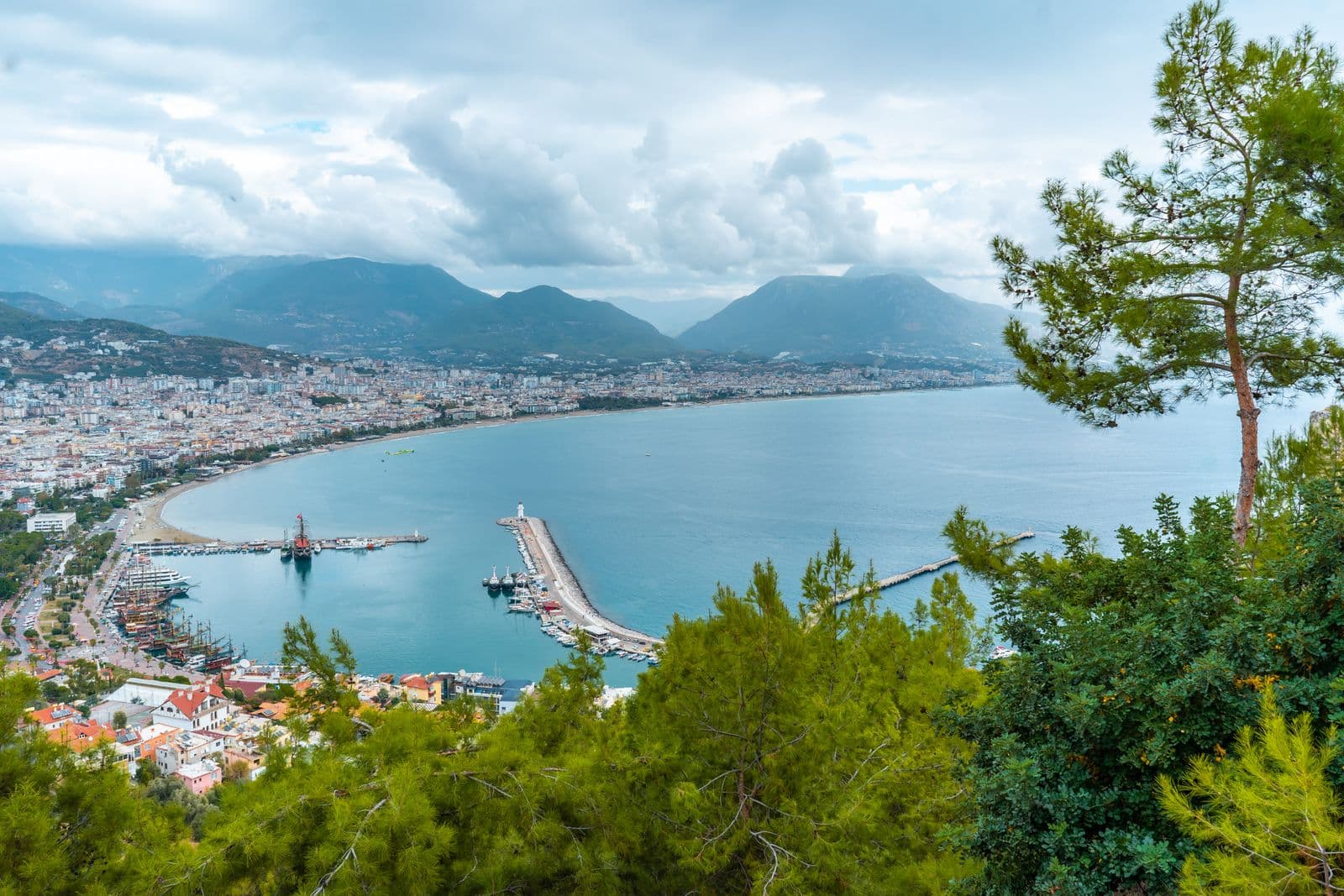 Aerial view of the Alanya coastline, harbour and mountains in Turkey