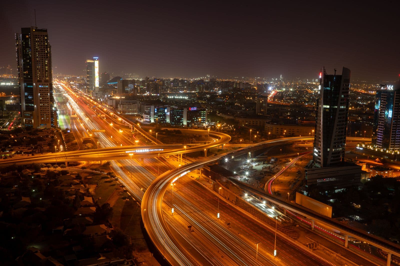 Aerial view of the illuminated Dubai skyline at night